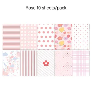 Macro view of 10 assorted rose-themed scrapbook paper patterns in pink tones