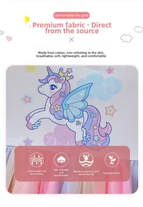 Dettaglio vestito da bambina in cotone con stampa unicorno e strati in tulle colorato