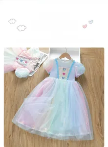 Detailed look at the rainbow mesh tutu skirt and sparkly heart gems on the girl's dress