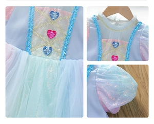 Detail of girls princess dress with heart sequins and glitter mesh tulle layers