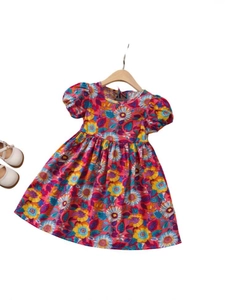 Pink floral cotton dress for girls with vibrant daisy prints and puff sleeves