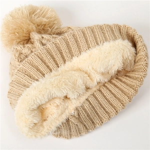 Winter knit beanie for women with warm fleece lining and large fluffy pompom