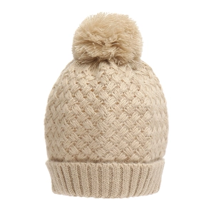 Detail showing thick beige knit texture and fluffy pom-pom on the warm winter beanie