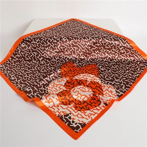 90cm square silk scarf with orange and brown floral patterns and letter prints