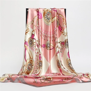 Silk satin square scarf with vintage gold chain and medallion patterns in pastel pink