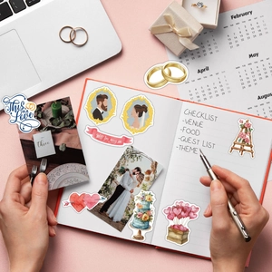 Detailed close-up of watercolor wedding stickers on a planner with romantic theme elements