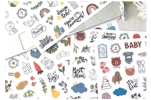 Detail of multi-sheet baby milestone stickers with hand-drawn animal and rainbow designs