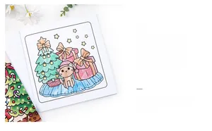 Detail of Christmas coloring book page with a colored cat and tree using markers