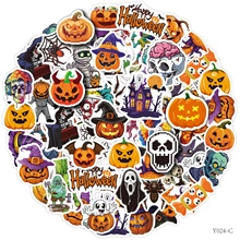 Detailed flat lay of Halloween stickers featuring pumpkins, ghosts, and spooky characters