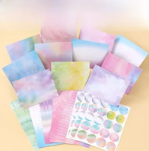 Macro detail of watercolor gradient stationery set with envelopes and sealing stickers