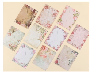 Collection of ten vintage floral envelopes with European pastoral rose and botanical prints
