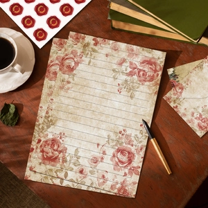 Vintage floral stationery set with rose letters, envelopes and wax seal stickers on wood