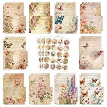 Flat lay of watercolor Halloween stationery set with pumpkin patterns and stickers