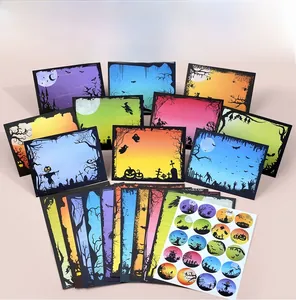 Halloween stationery set with pumpkin and witch motifs, including envelopes and stickers