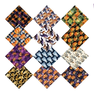Twelve varied Halloween patterned scrapbooking papers with pumpkin and ghost designs