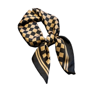 Classic black and gold checkered silk scarf with soft texture for professional wear