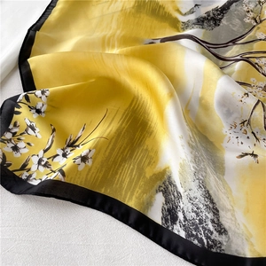 Elegant floral and bird silk scarf in yellow and white with classic black border