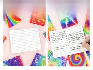 Detailed view of tie-dye mini notebook set featuring lined pages and compact portable size