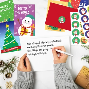 72-piece Christmas card set with stickers and red envelopes featuring snowman designs