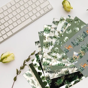 Forest watercolor scrapbooking paper with elk and pine trees for creative DIY crafts
