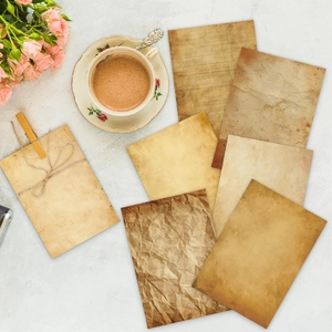 7-piece set of vintage A5 scrapbooking paper with textured earthy tones and line patterns