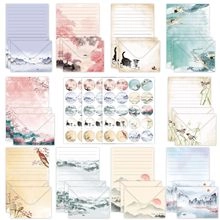 Close-up of 10 vintage floral and landscape stationery sets with matching seals and envelopes