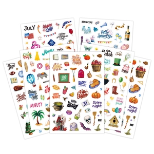 Close-up of 263 hand-drawn watercolor planner stickers with monthly and holiday themes