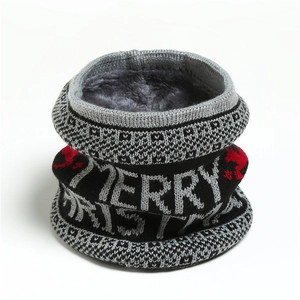 Close-up of winter knit neck warmer with Merry Christmas pattern and plush lining