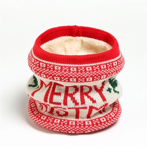 Detail of knitted Christmas neck gaiter with soft fleece lining and festive lettering
