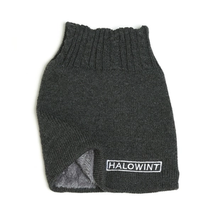 Close-up of knit neck warmer showing thick fleece lining and white embroidered logo