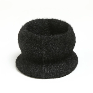 Close-up of black knitted snood scarf featuring soft fuzzy mohair texture for winter
