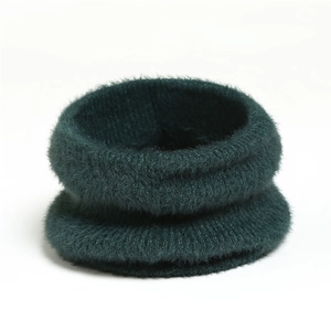 Detail of dark green mohair neck warmer showing soft plush texture and fluffy knit surface