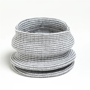 Detail of grey and white striped knit neck warmer with elastic ribbed texture