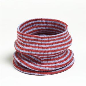 Detail of red and blue striped ribbed knit neck warmer with soft texture and pattern