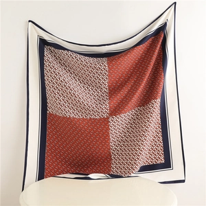 Elegant large silk scarf featuring red and navy blue geometric chain pattern