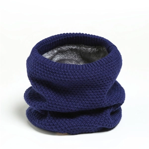 Detail of dark blue knit snood with thick grey plush lining for winter warmth