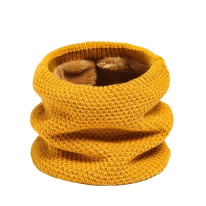 Winter knitted neck warmer in yellow with thick fleece lining and grid texture pattern