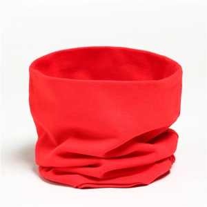 Detailed close-up of a vibrant red knitted neck warmer scarf with soft ribbed texture