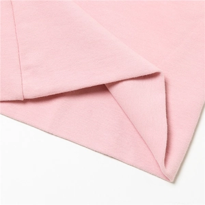 Soft pink cotton knit neck warmer with fine texture and neat stitching details