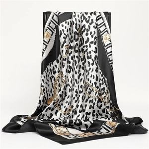 Luxurious 90cm leopard print silk scarf with golden chain patterns and geometric border