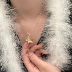 Exquisite gold butterfly necklace with shimmering pavé zircon pendant for women