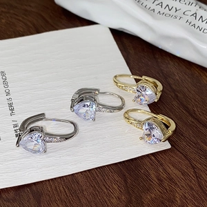 Golden and silver heart-shaped zircon hoop earrings with micro-paved crystal accents