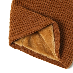 Detail of warm caramel knit gaiter with thick fleece lining and soft ribbed texture
