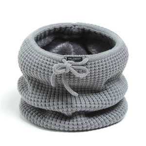 Detail of gray knitted neck warmer showing waffle texture and thick warm fleece lining