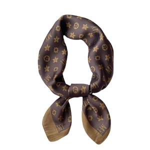 Elegant brown monogram silk scarf for women featuring a stylish knot design