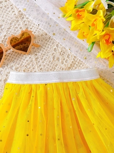 Yellow tutu skirt for girls with gold star sequins and silver elastic waistband