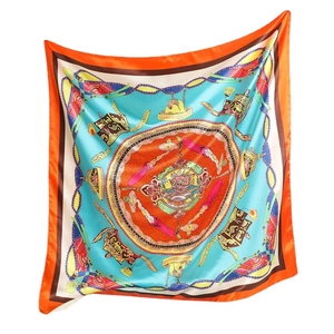 Square silk scarf with dragon totem print and orange borders on light blue background
