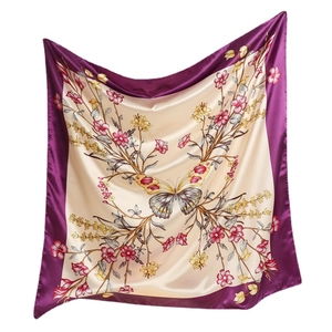 Elegant silk scarf featuring a large butterfly and floral patterns with a purple border