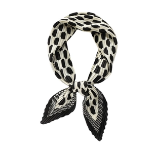 Pleated polka dot silk scarf in black and white with accordion fold texture