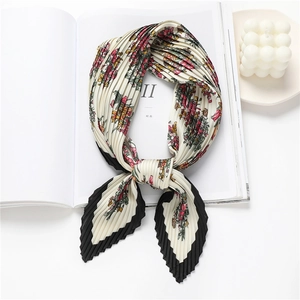 Elegant floral print pleated silk scarf in beige with vibrant flower patterns and gift styling